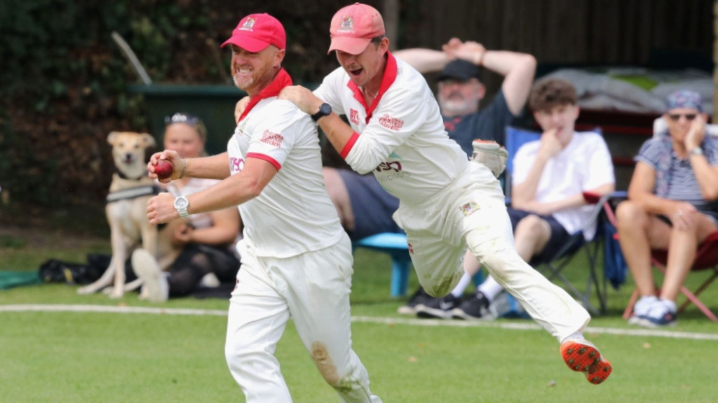 PAINSWICK are through to the quarter-finals of the Voneus Village Cup after a tremendous six-wicket victory away to Goatacre. Painswicks Julian Telling is congratulated after taking a fine catch image courtesy Philip Wilcox Photography | Painswick are group champions