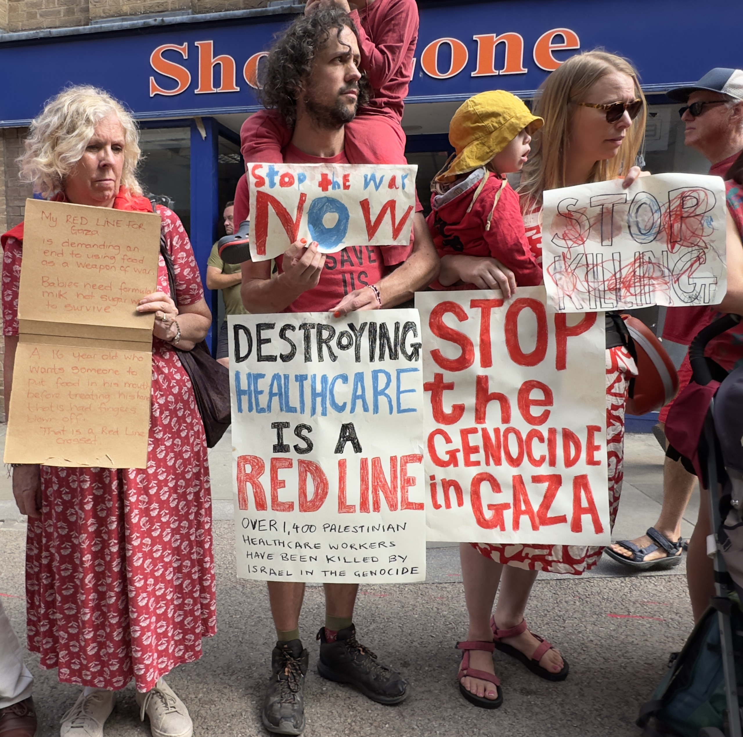7.Placards RedLineForGaza JamesB Copyright Deborah Roberts IMG 9041 scaled | In pictures: Stroud joins nationwide Red Line for Gaza demonstration